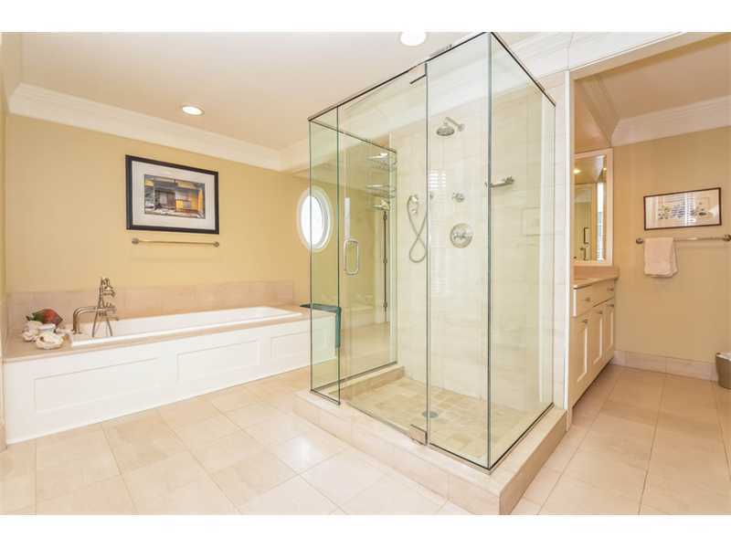 106 Goodwives River Road Darien, CT 06820 - Photo 15 of 24 a bathroom with a shower and a bath tub