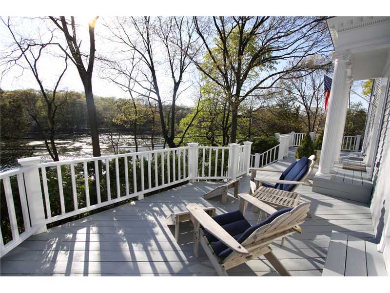 106 Goodwives River Road Darien, CT 06820 - Photo 21 of 24 a view of balcony with wooden floor and outdoor seating