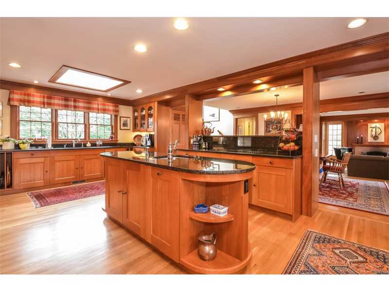 106 Goodwives River Road Darien, CT 06820 - Photo 10 of 24 a kitchen with stainless steel appliances granite countertop a sink and a counter top space