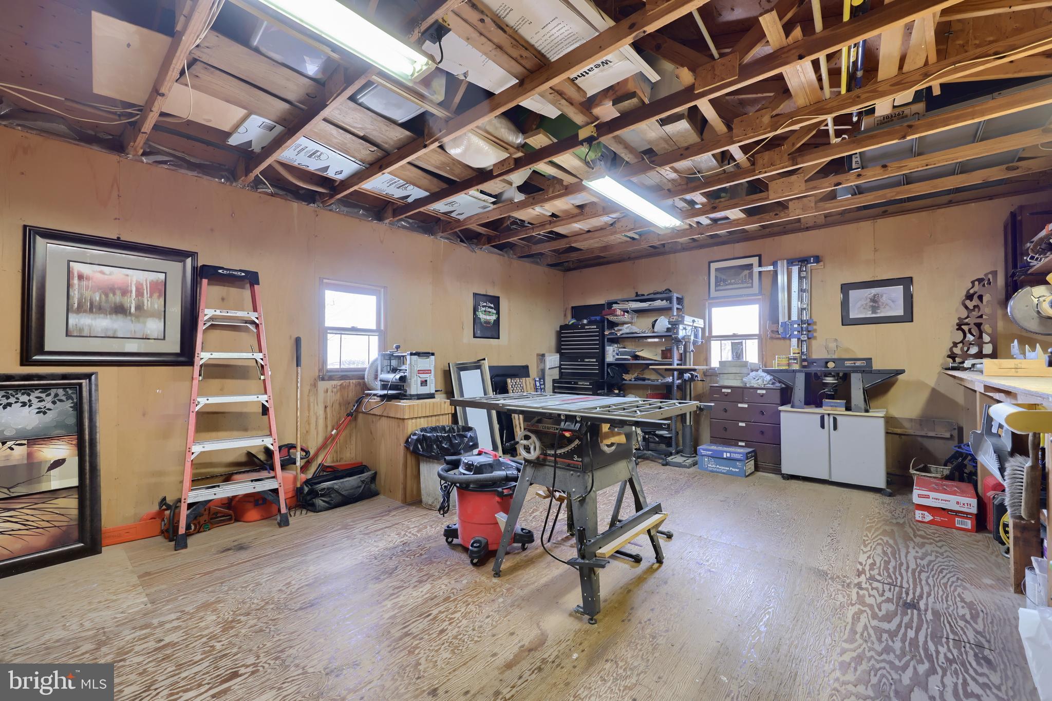 260 Valley Road Conestoga, PA 17516 - Photo 44 of 48 a view of a room with workspace and a window
