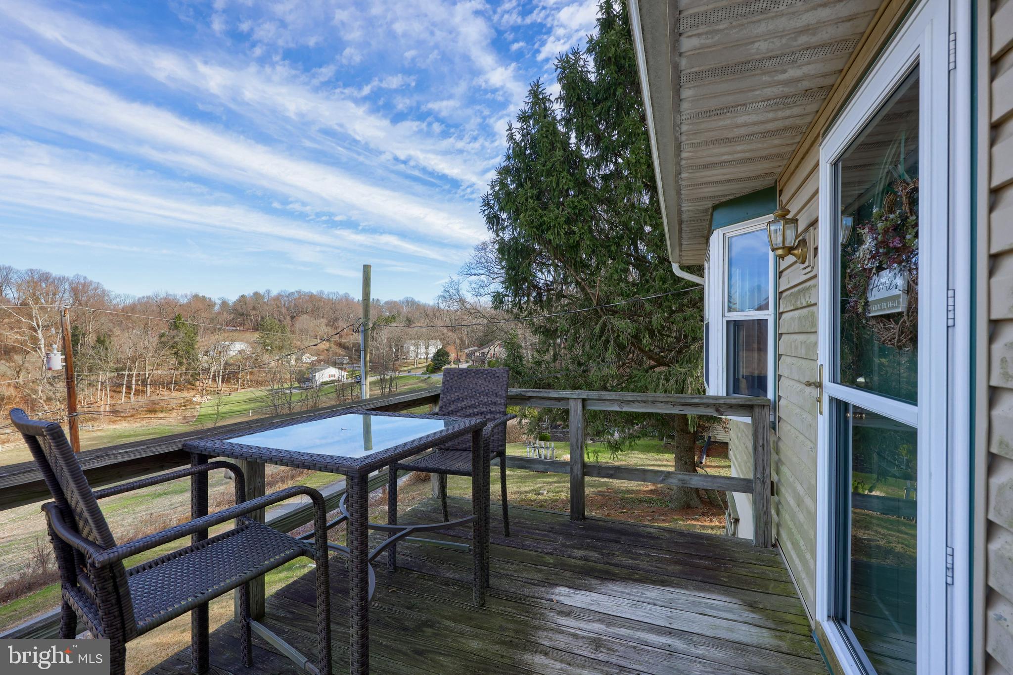 260 Valley Road Conestoga, PA 17516 - Photo 5 of 48 a view of a chairs and table in the balcony