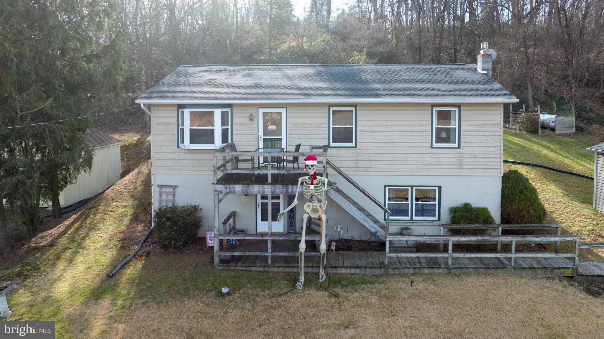 260 Valley Road Conestoga, PA 17516 - Photo 7 of 48 a view of a house with a yard and sitting area