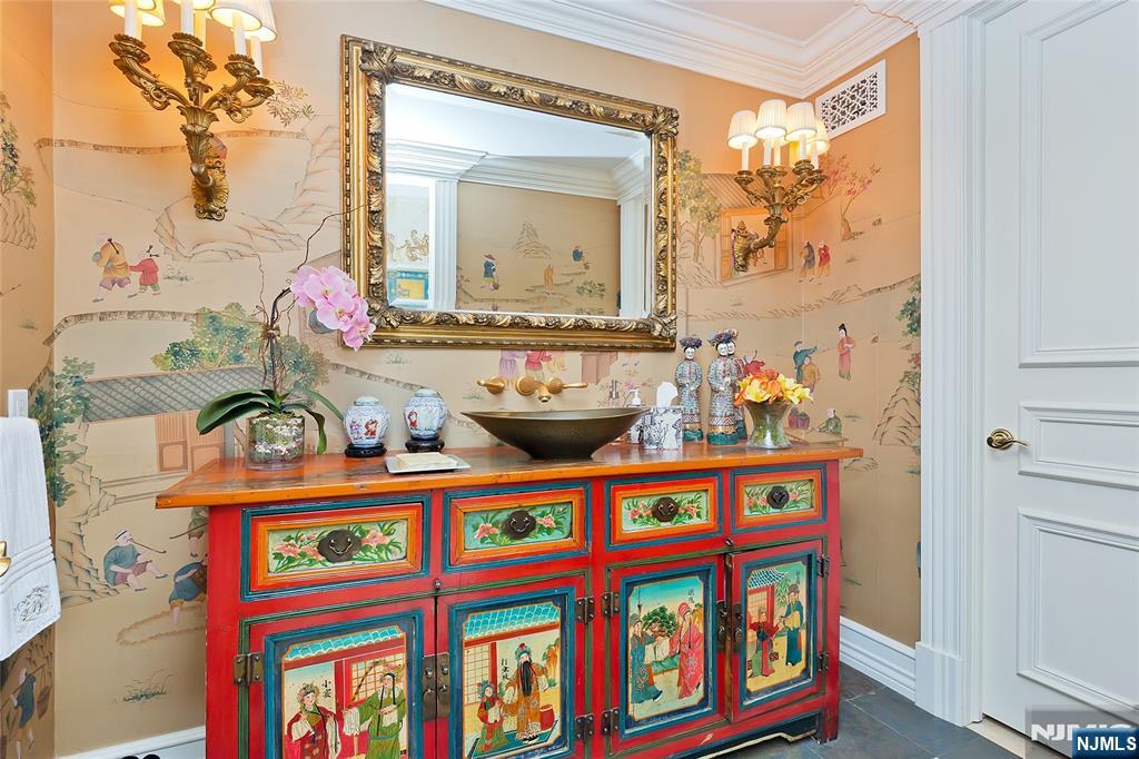 12 The Esplanade Alpine, NJ 07620 - Photo 14 of 41 a front view of a house with outdoor seating