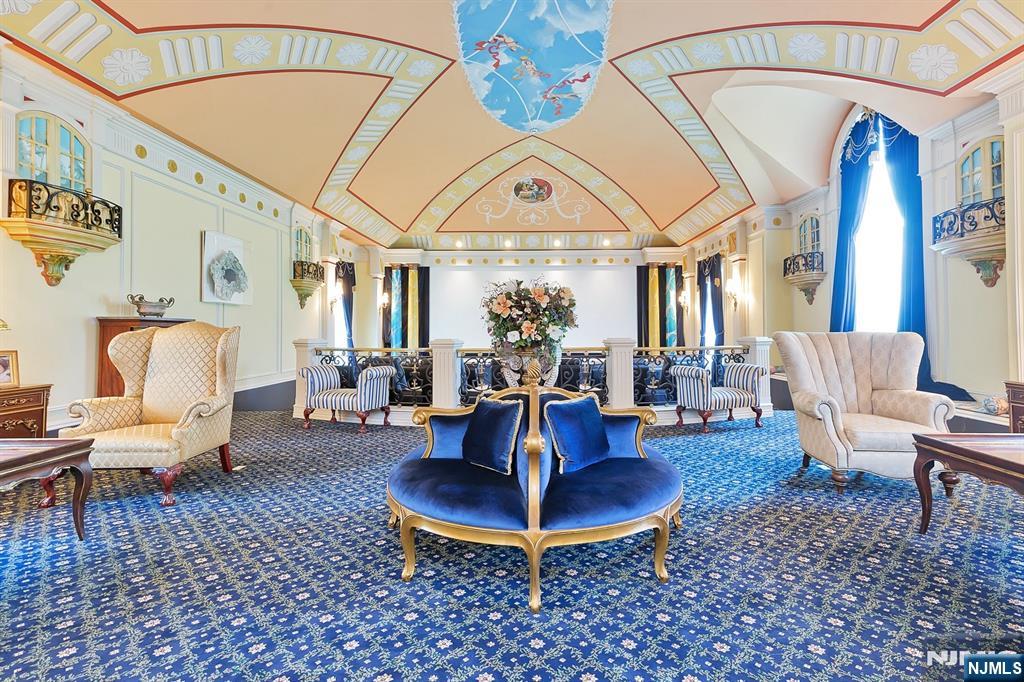 12 The Esplanade Alpine, NJ 07620 - Photo 18 of 41 a living room with furniture a table and chair