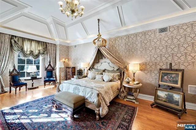 a bed room with a bed and a window