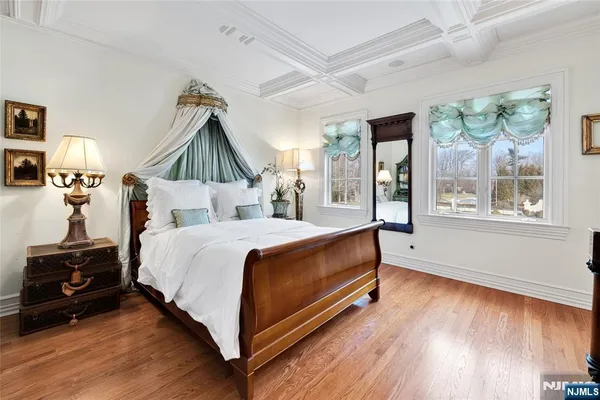a bed room with a bed and a window