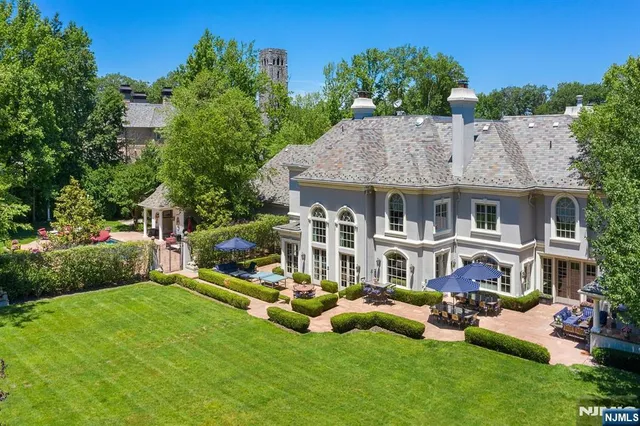 an aerial view of a house with a garden