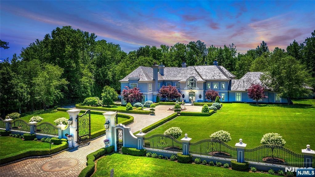 12 The Esplanade Alpine, NJ 07620 - Photo 40 of 41 a aerial view of a house with swimming pool garden and patio