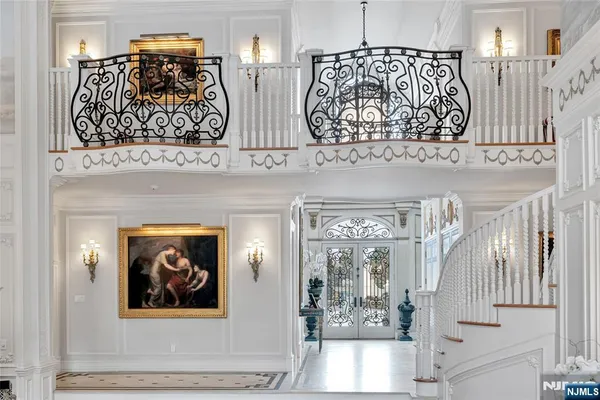 a living room with furniture fireplace and a lamp