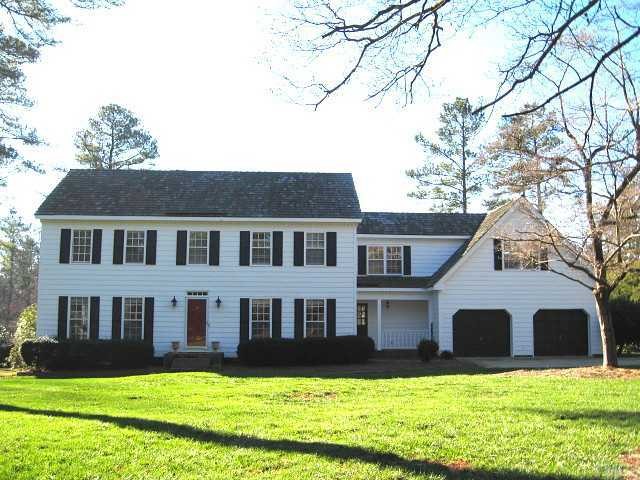 308 Sandhurst Road Raleigh, NC 27615 - Photo 1 of 12 a front view of house with yard and green space