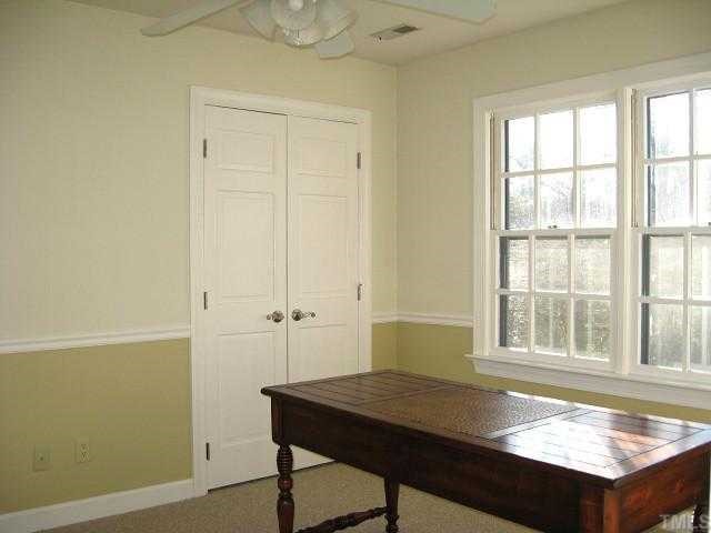 308 Sandhurst Road Raleigh, NC 27615 - Photo 10 of 12 a view of a room that has a window in it