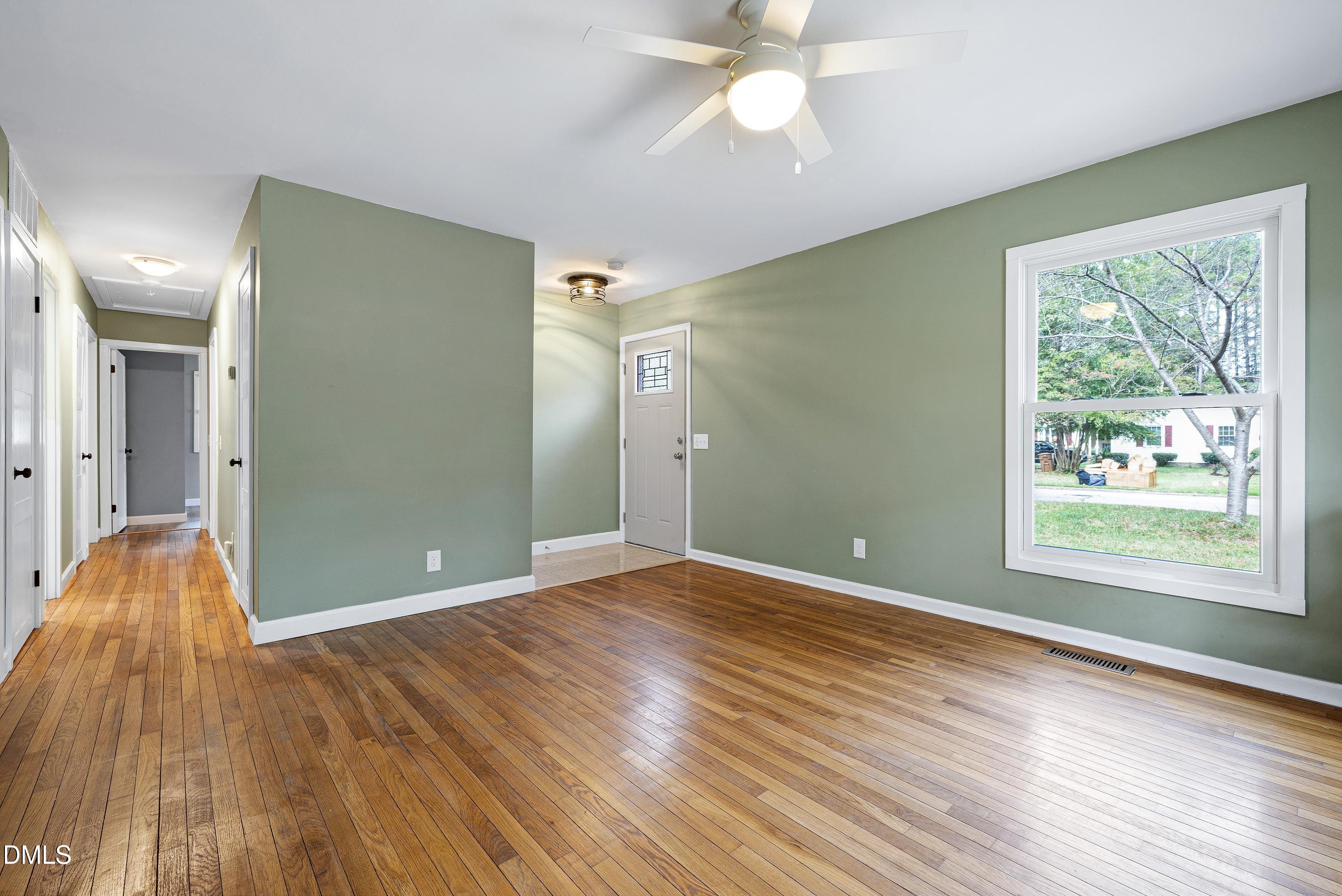 5817 Newhall Road Durham, NC 27713 - Photo 5 of 51 Original Ceramic Tile Floor in Entry with Coat Closet