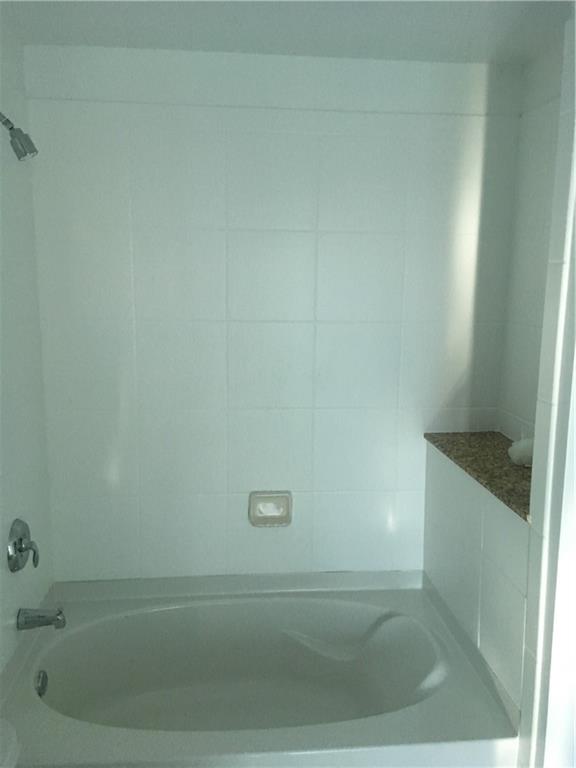 3324 Peachtree Road, Unit 2213 Atlanta, GA 30326 - Photo 13 of 42 a bathroom with a bathtub