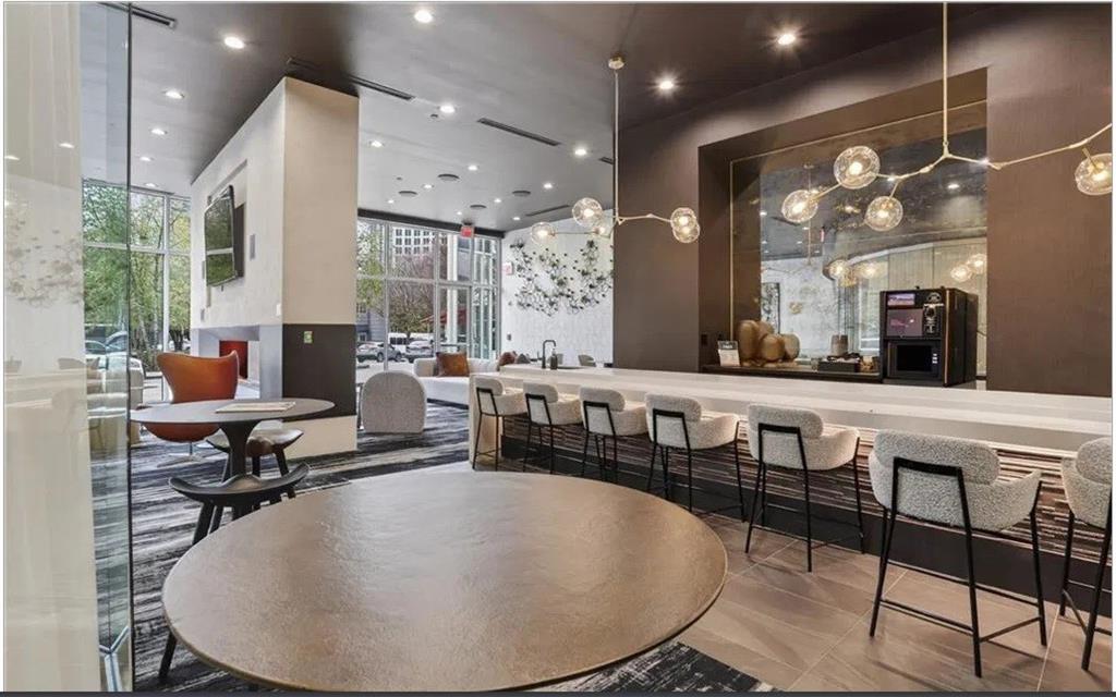 3324 Peachtree Road, Unit 2213 Atlanta, GA 30326 - Photo 26 of 42 a room with lots of chairs and mirrors