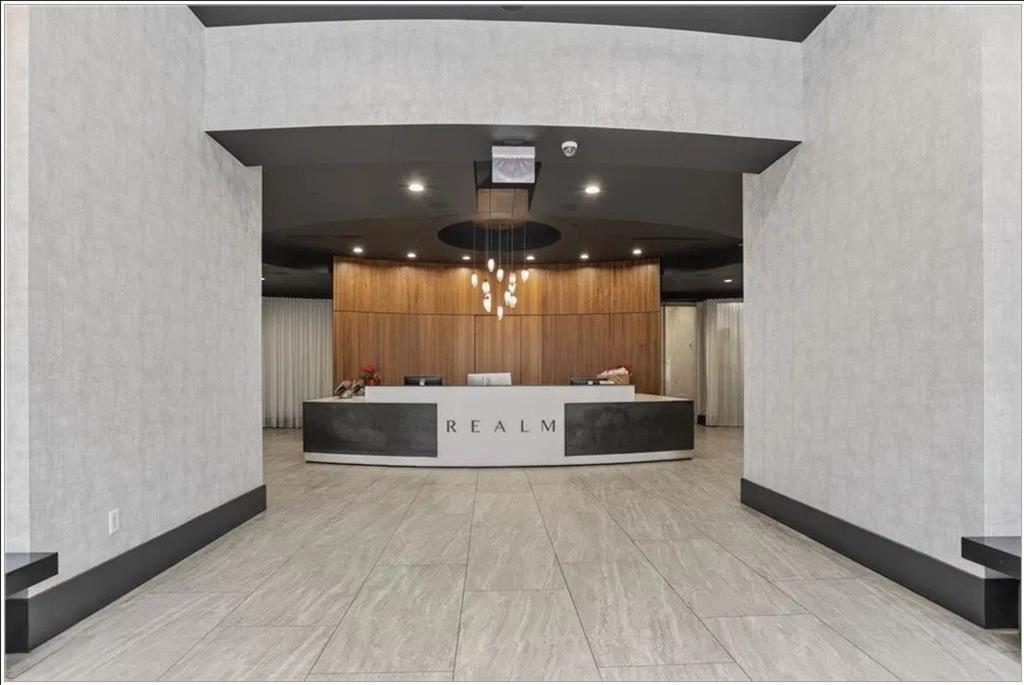 3324 Peachtree Road, Unit 2213 Atlanta, GA 30326 - Photo 32 of 42 a large white building with a sink and a large mirror next to a window