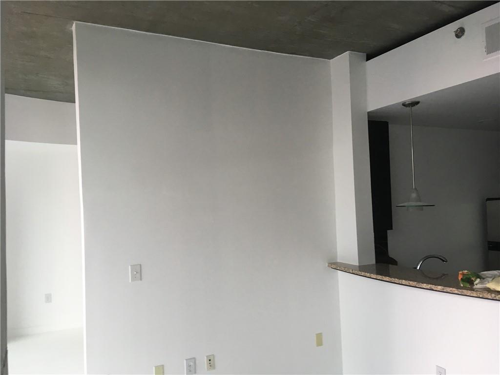 3324 Peachtree Road, Unit 2213 Atlanta, GA 30326 - Photo 4 of 42 a bathroom with a sink and a mirror