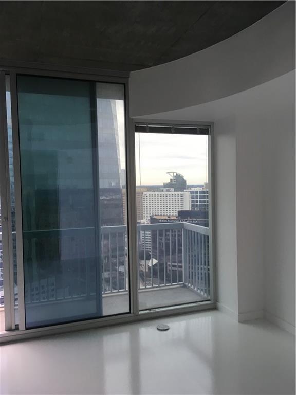 3324 Peachtree Road, Unit 2213 Atlanta, GA 30326 - Photo 10 of 42 a view of empty room with floor to ceiling window