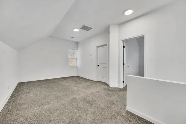 a view of a garden with basketball court