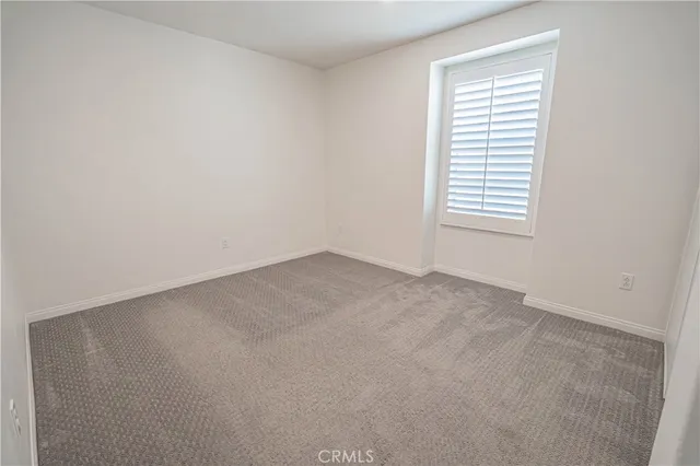 a view of a hallway with entryway