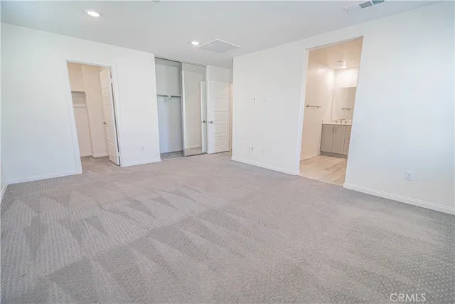 a bathroom with a mirror and a shower