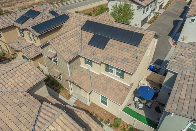a large kitchen with stainless steel appliances granite countertop a lot of counter space and a sink