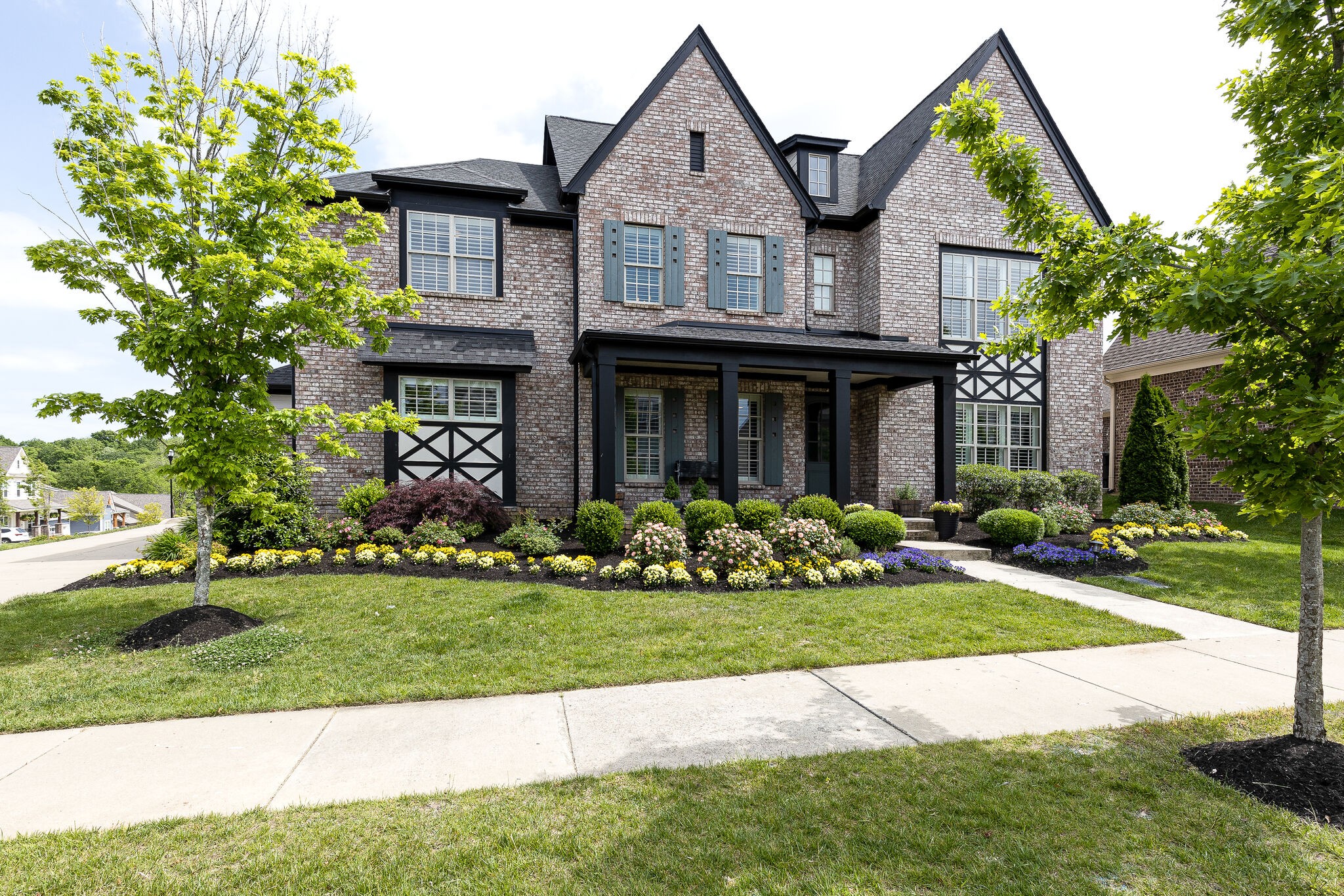 344 Beamon Drive Franklin, TN 37064 - Photo 1 of 1 a front view of a house with a yard and garage