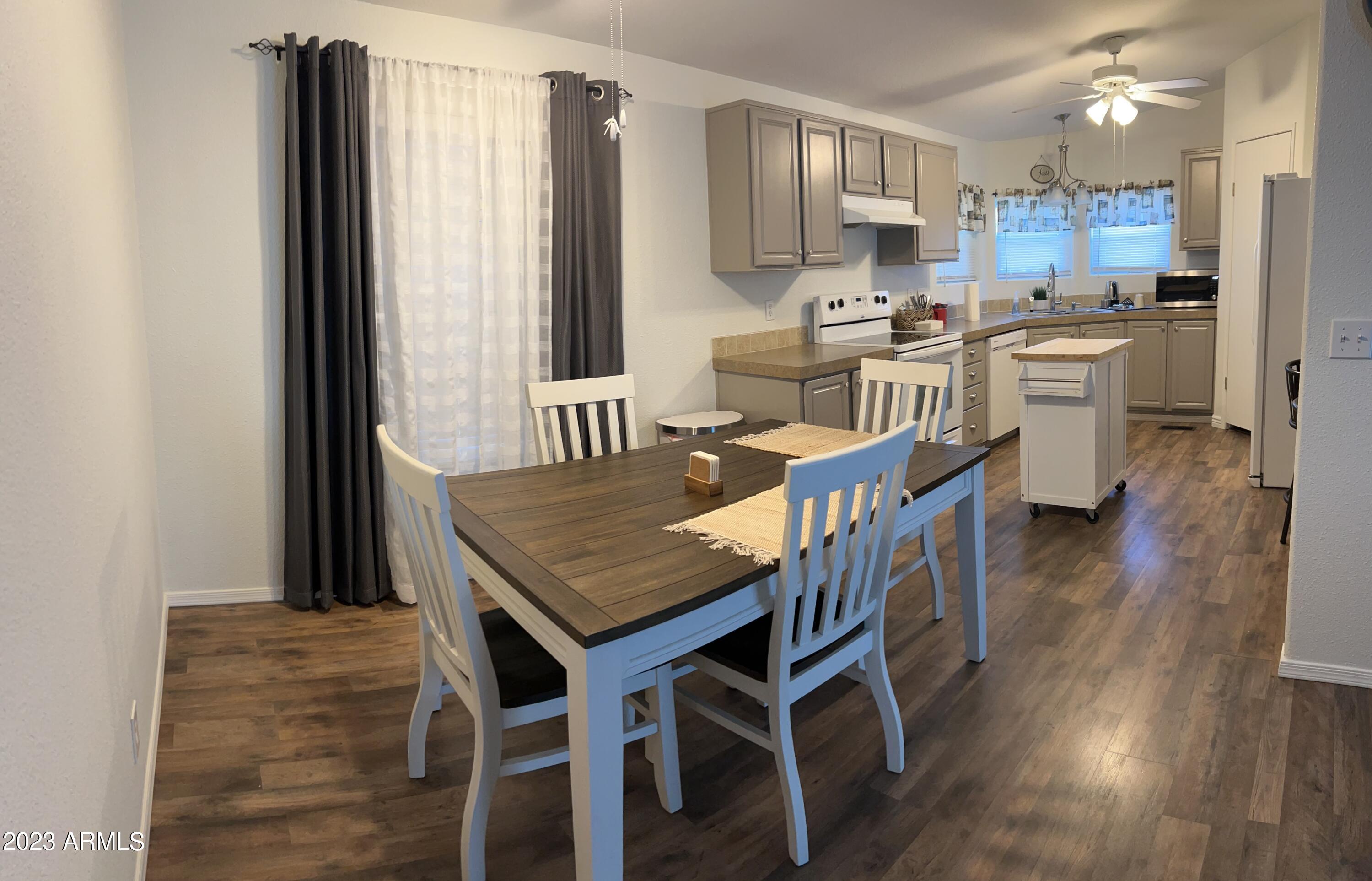 3700 South Tomahawk Road, Unit 10 Apache Junction, AZ 85119 - Photo 7 of 15 DINING ROOM