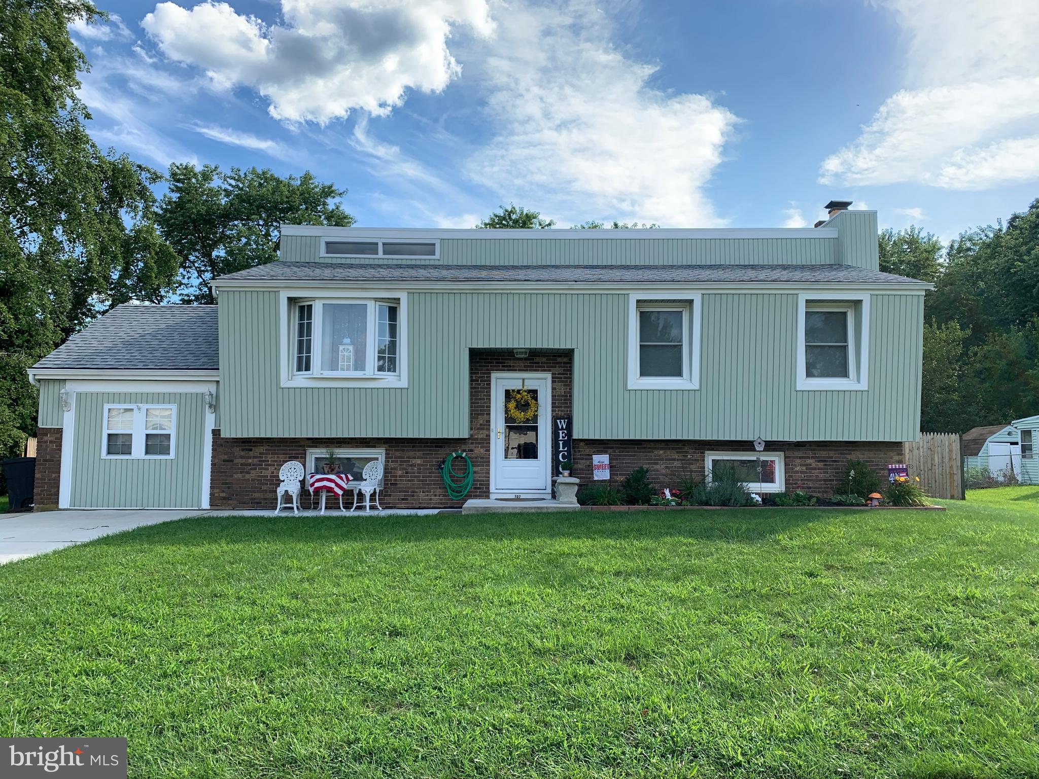 107 Capella Road Sewell, NJ 08080 - Photo 1 of 22 a house that is sitting in the grass