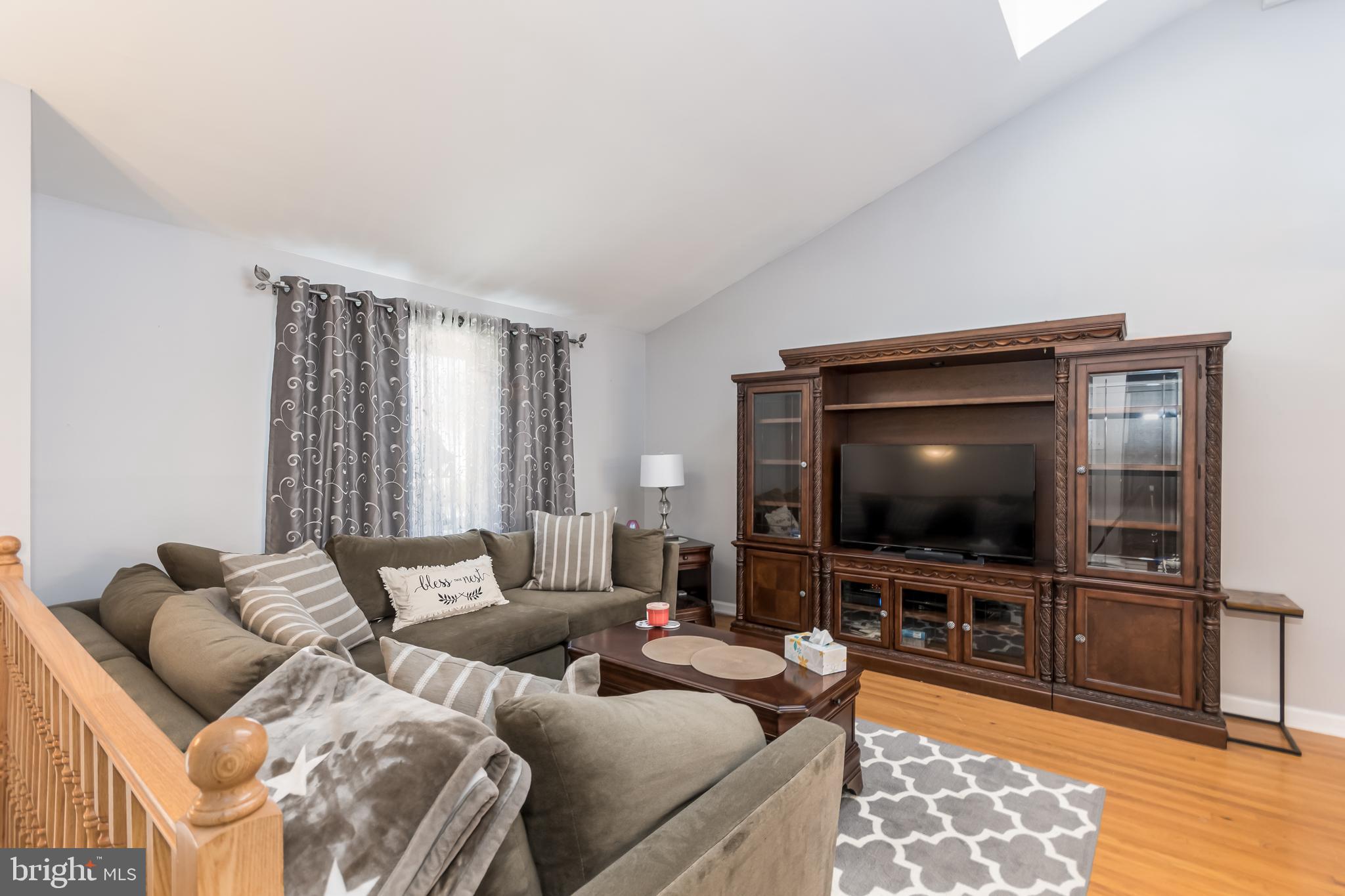 107 Capella Road Sewell, NJ 08080 - Photo 11 of 22 a living room with furniture and a flat screen tv