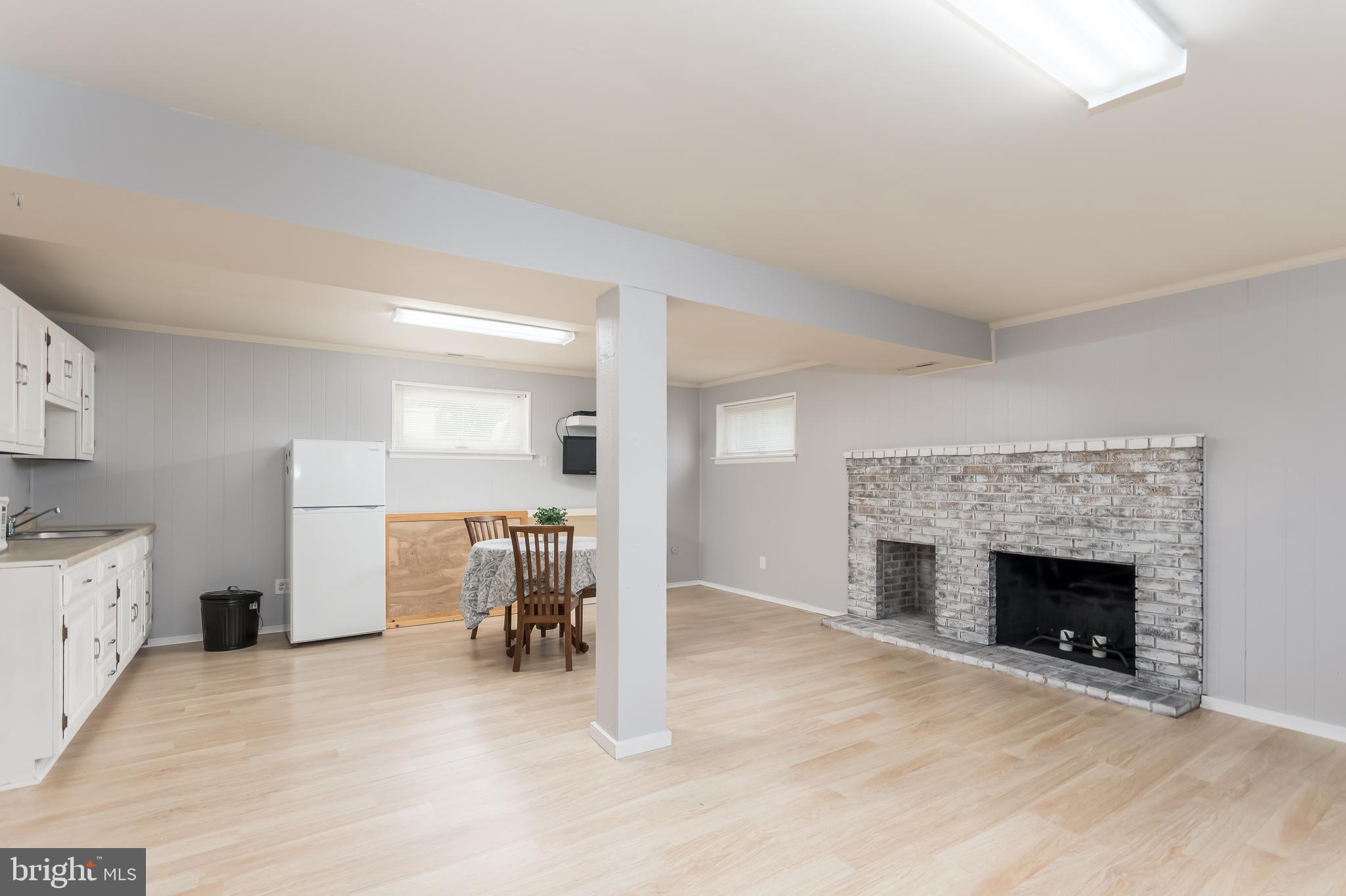 107 Capella Road Sewell, NJ 08080 - Photo 3 of 22 a view of livingroom with furniture and fireplace