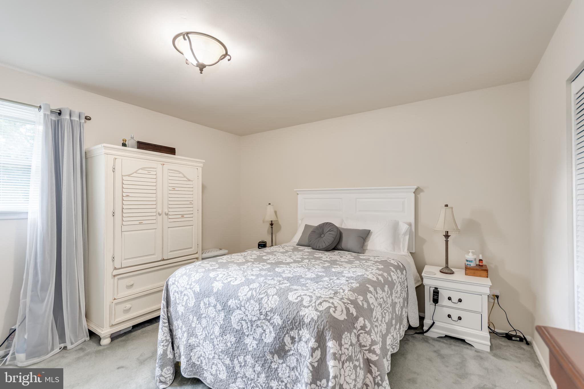 107 Capella Road Sewell, NJ 08080 - Photo 7 of 22 a bedroom with a bed and a window