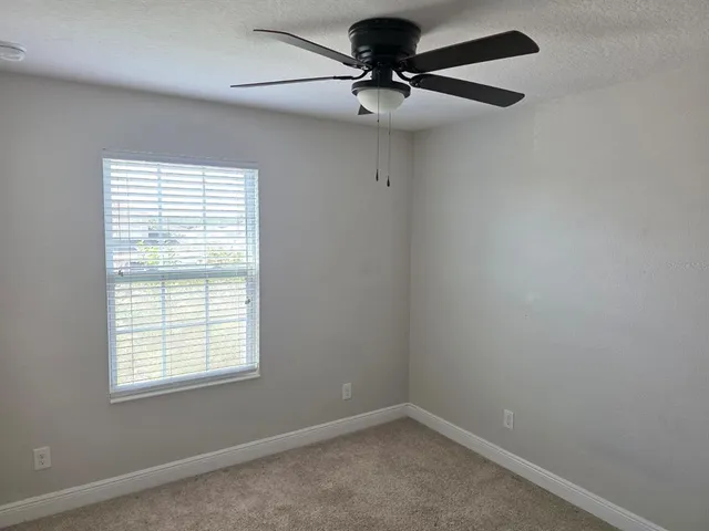 a bathroom with a sink and bathtub with shower