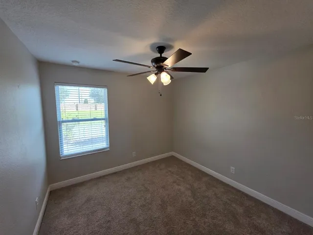 a bathroom with a double vanity sink and mirror