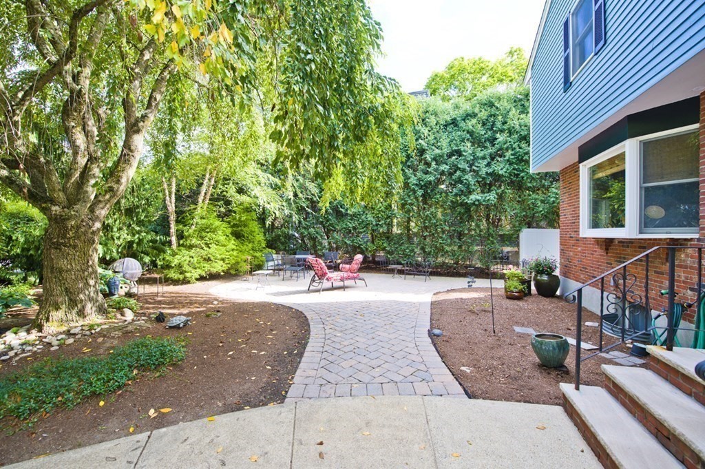 16 Warren Avenue Newton, MA 02465 - Photo 32 of 42 a view of a backyard with a patio