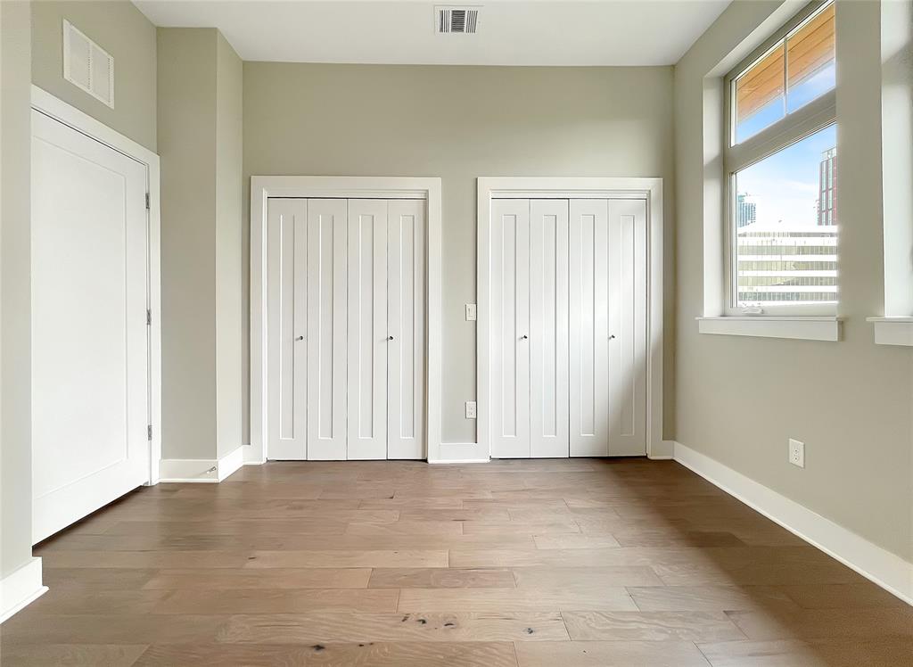 908 Nueces Street, Unit 42 Austin, TX 78701 - Photo 16 of 21 a view of an empty room with a window