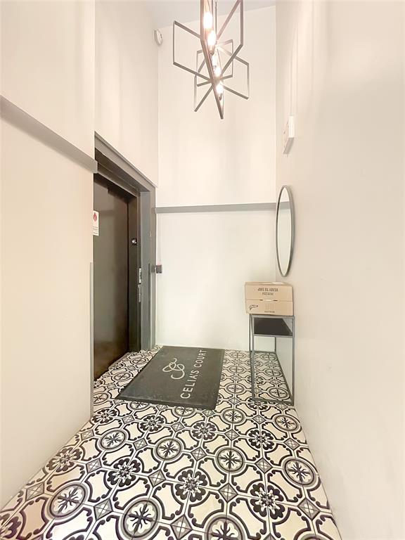 908 Nueces Street, Unit 42 Austin, TX 78701 - Photo 18 of 21 a front view of a house with a yard