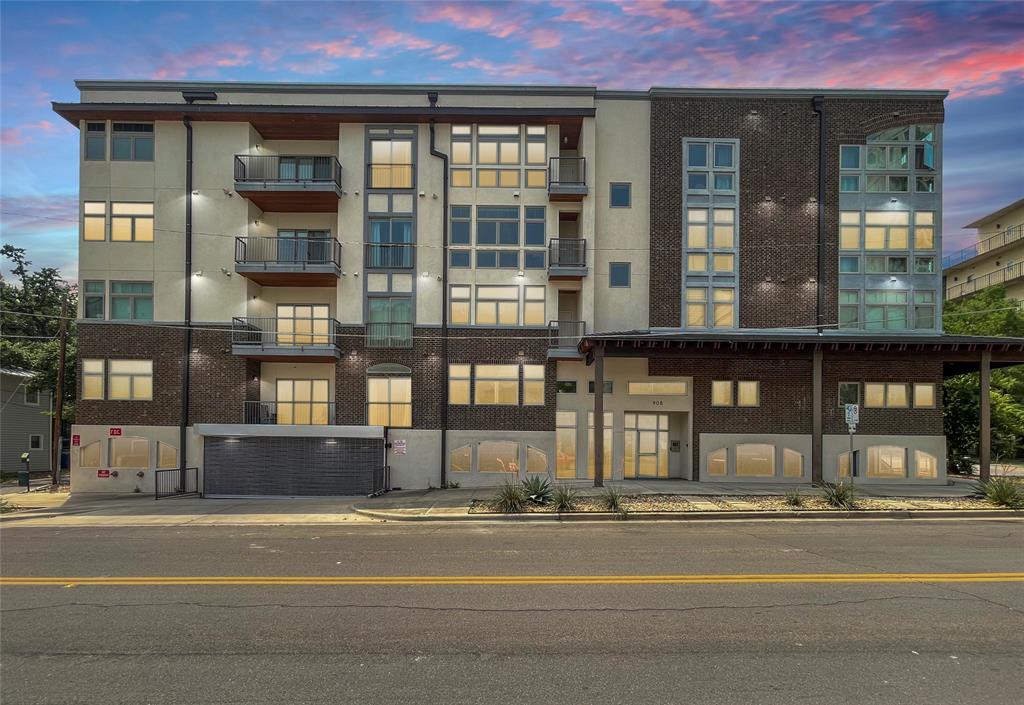 908 Nueces Street, Unit 42 Austin, TX 78701 - Photo 21 of 21 a view of a brick building with a large windows