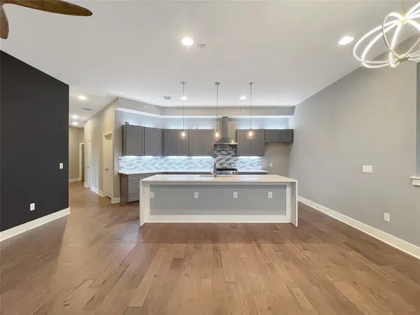 a view of a kitchen with a sink
