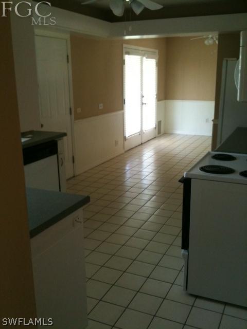 5524 Seville Road Fort Myers, FL 33919 - Photo 2 of 6 a view of a livingroom with wooden floor and a window