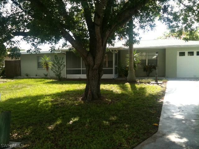 5524 Seville Road Fort Myers, FL 33919 - Photo 3 of 6 a view of a house with a yard