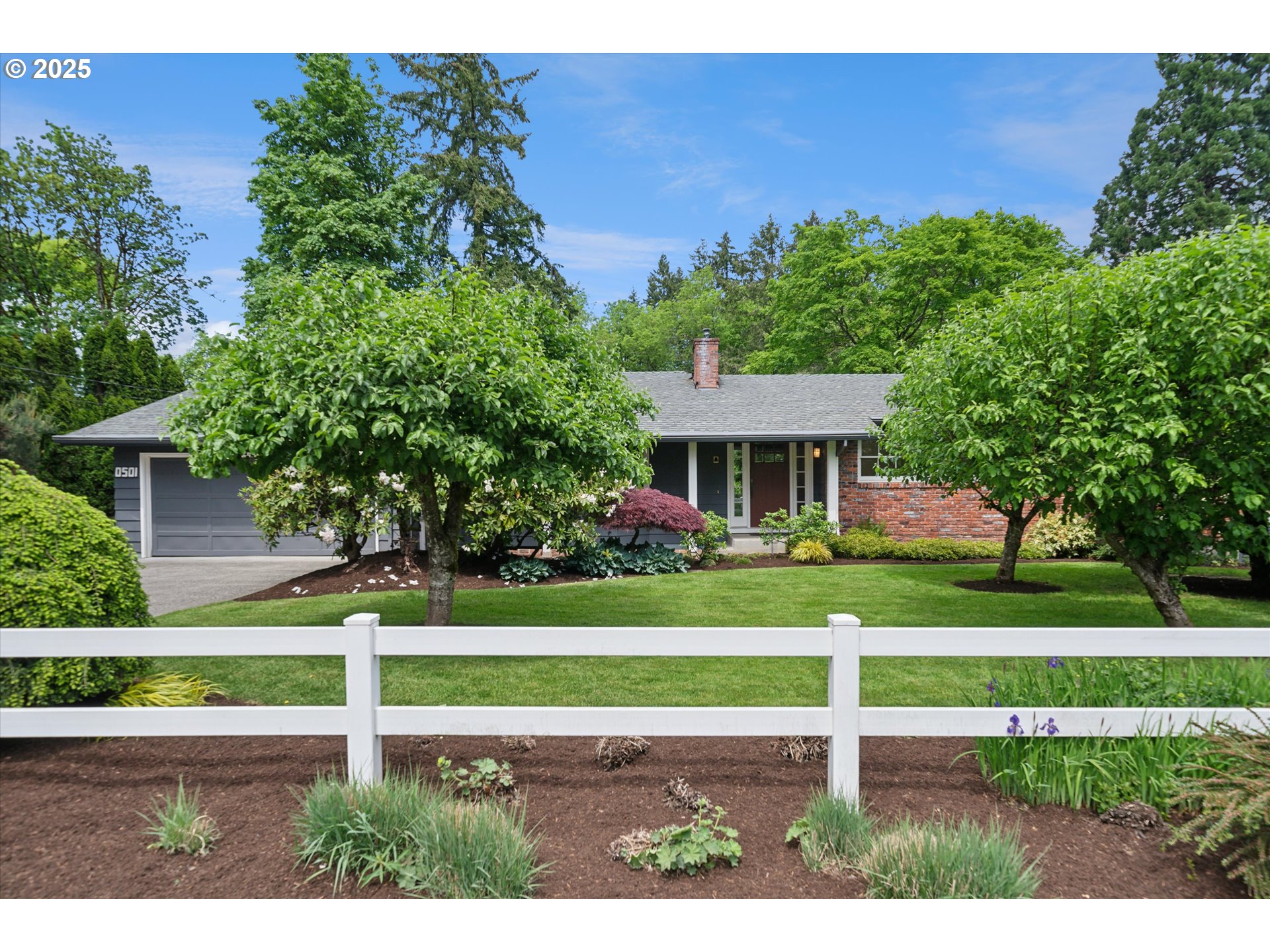 0501 South Riverside Street Portland, OR 97219 - Photo 1 of 45 a view of a house with a yard