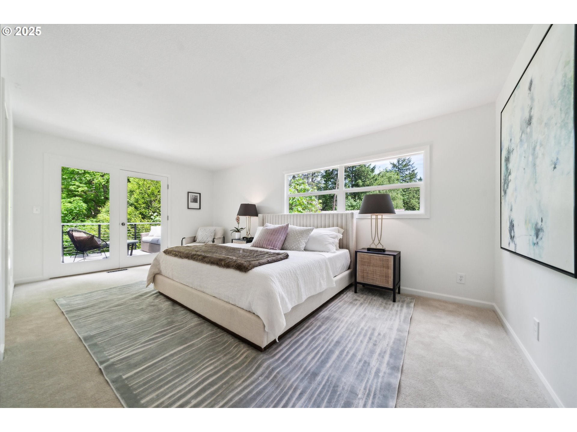 0501 South Riverside Street Portland, OR 97219 - Photo 21 of 45 a living room with furniture and a large window