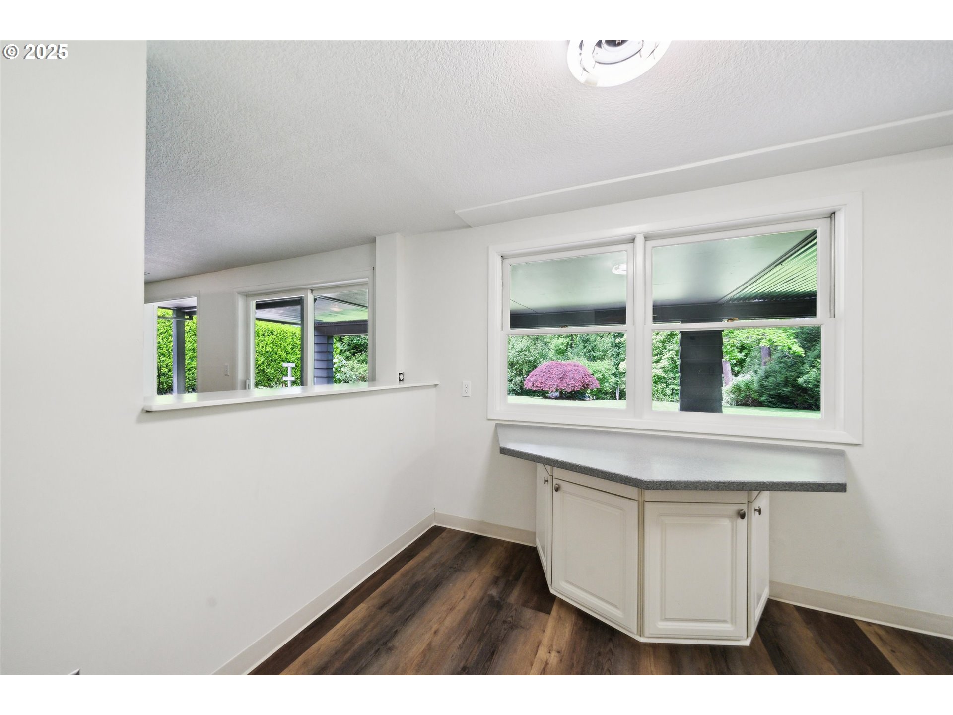 0501 South Riverside Street Portland, OR 97219 - Photo 30 of 45 a view of kitchen with wooden floor and window