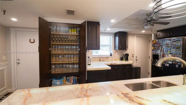a view of a dining room with furniture and a table