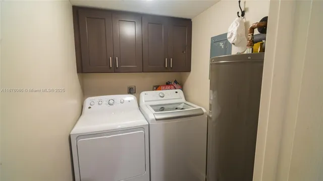 a view of a large kitchen with a sink