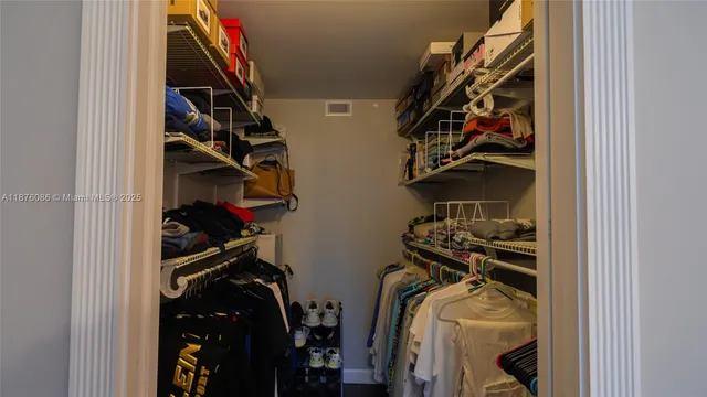 a living room with furniture and a gate
