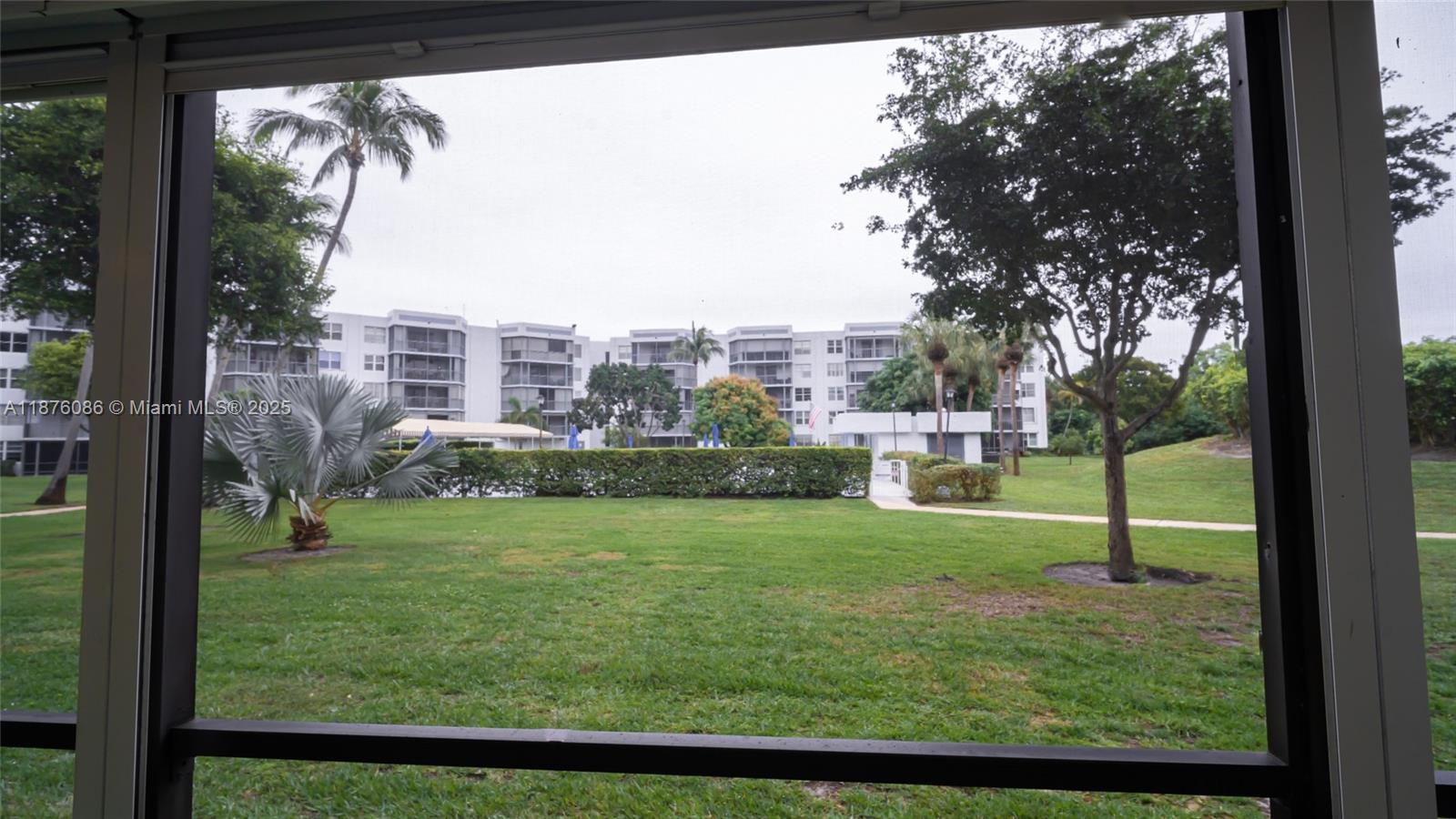 6500 Northwest 2nd Avenue, Unit 114 Boca Raton, FL 33487 - Photo 62 of 71 a view of a city from a living room
