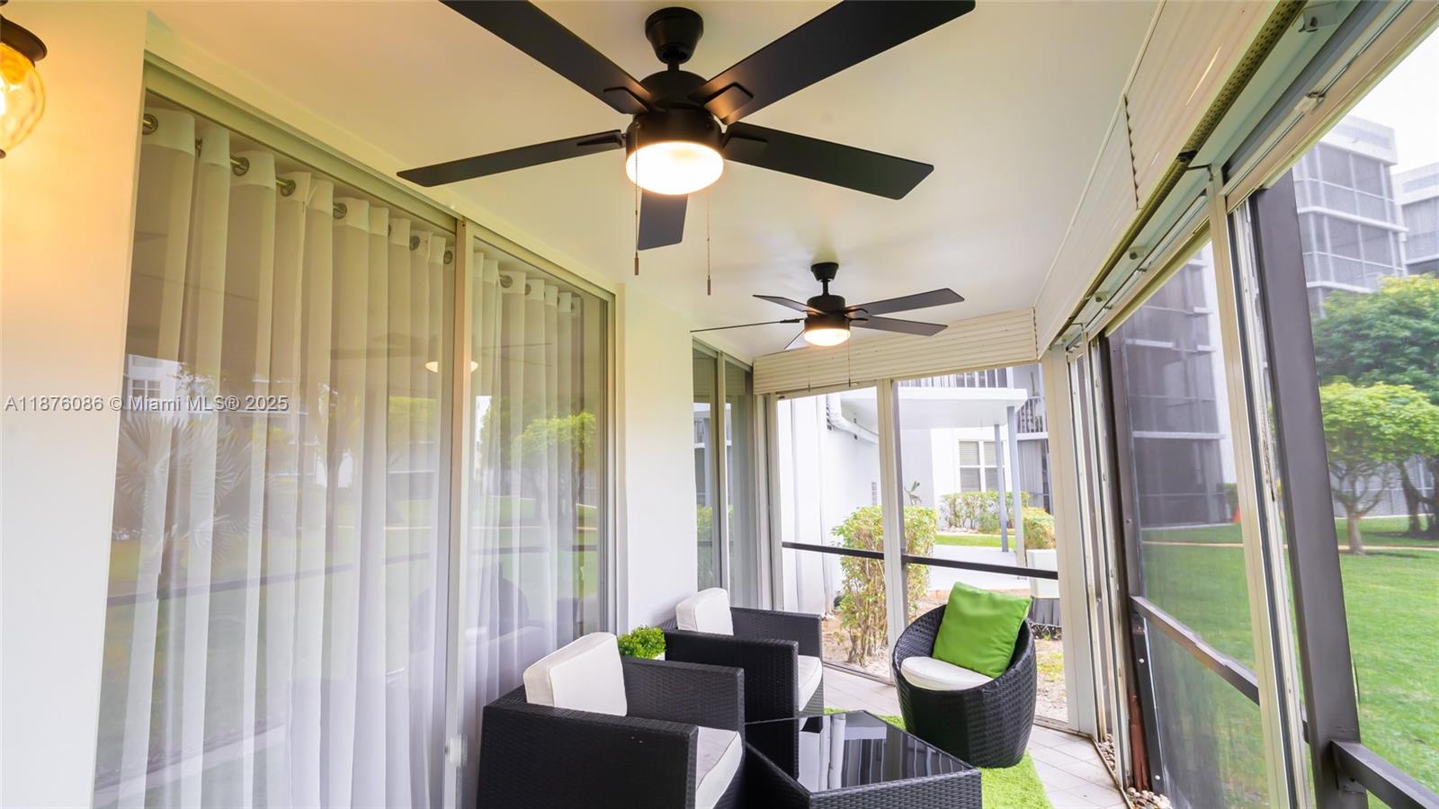 6500 Northwest 2nd Avenue, Unit 114 Boca Raton, FL 33487 - Photo 63 of 71 a room with furniture and a window
