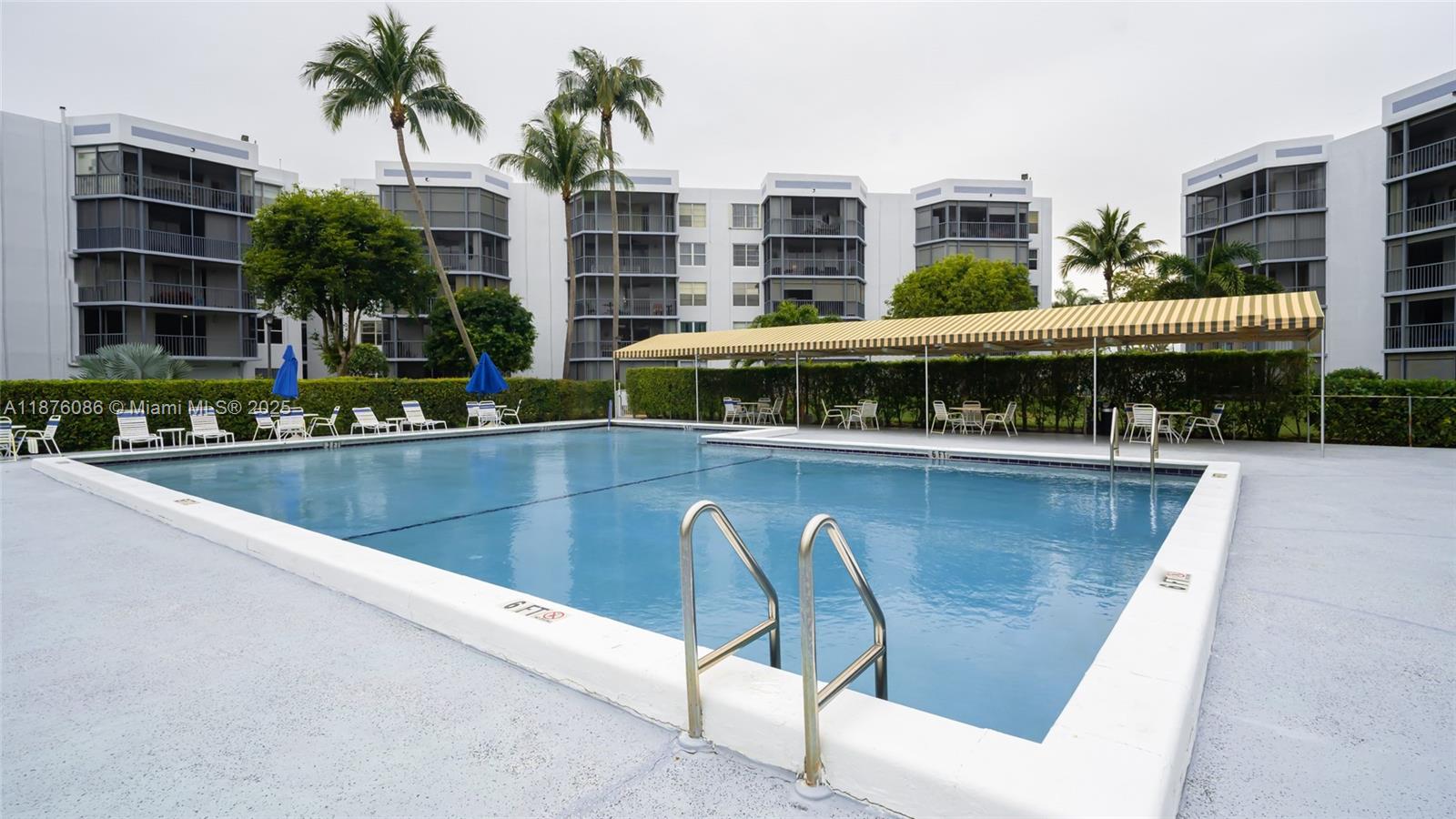 6500 Northwest 2nd Avenue, Unit 114 Boca Raton, FL 33487 - Photo 71 of 71 a view of a swimming pool with a patio