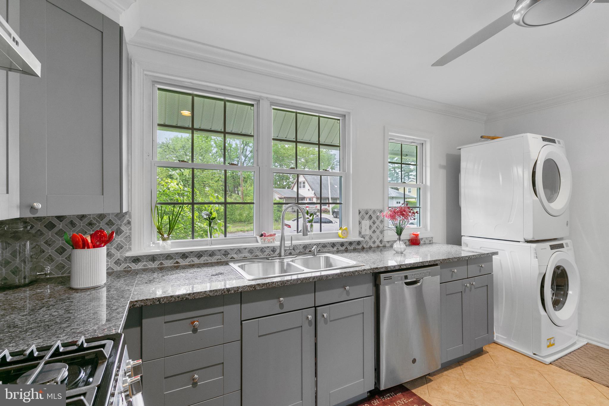 68 Shawmont Lane Willingboro, NJ 08046 - Photo 12 of 25 a kitchen with a sink and a stove